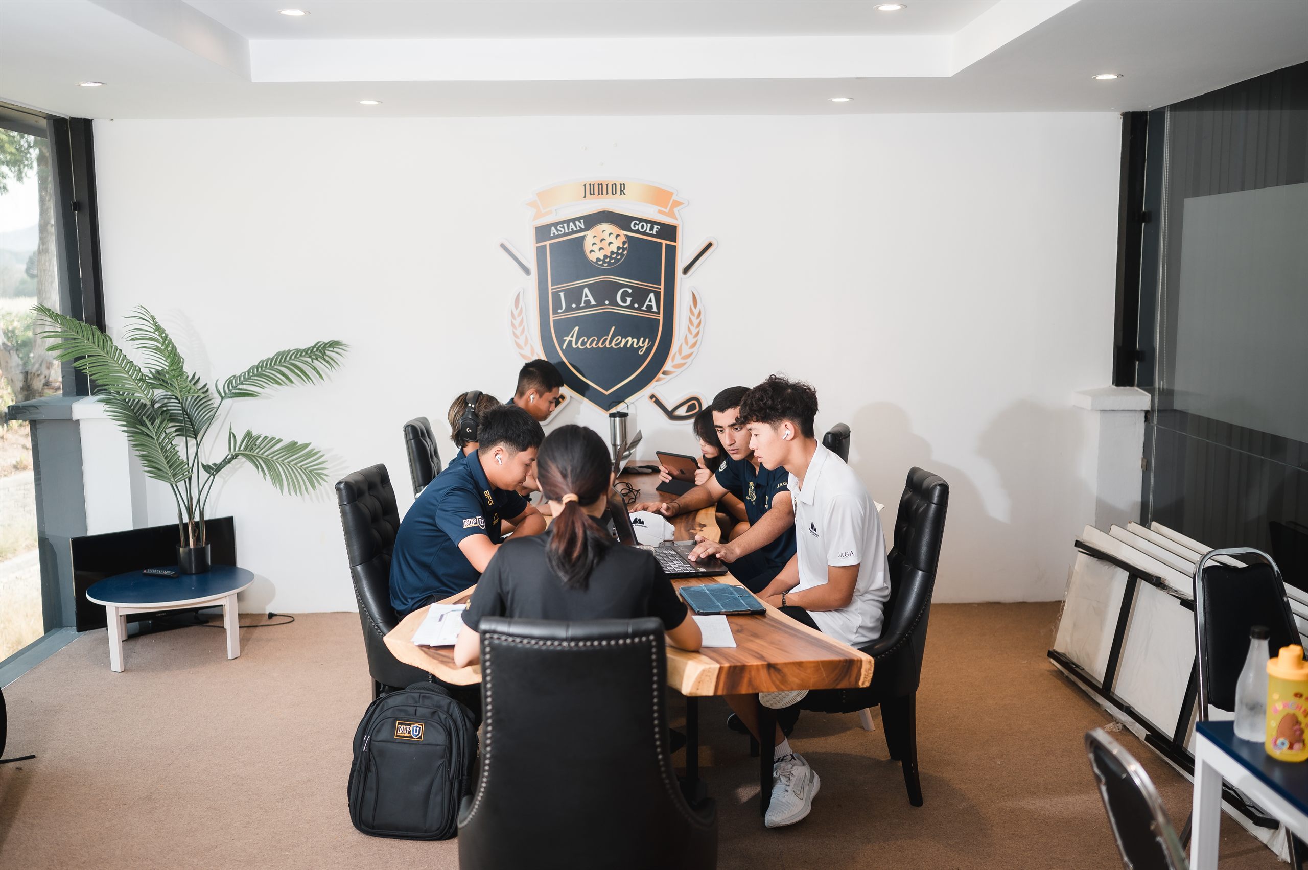 JAGA student-athletes studying together at the academy